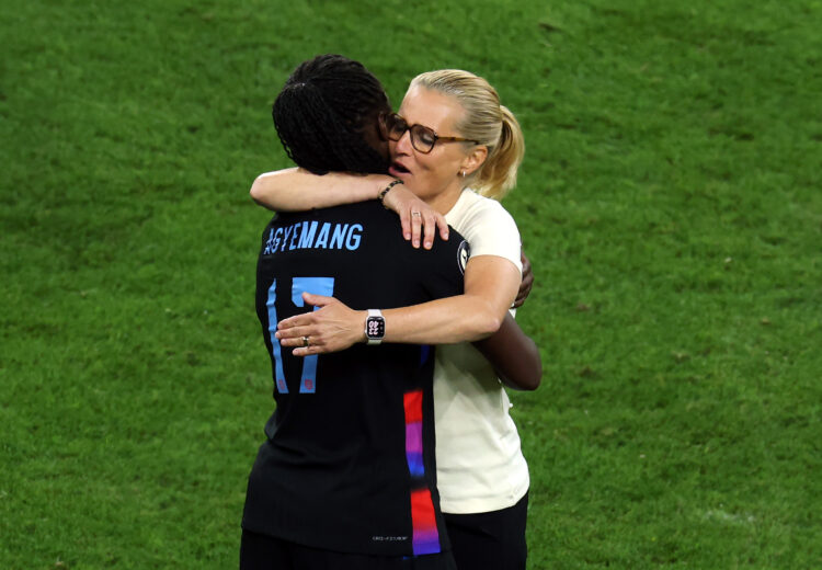 GENEVA, SWITZERLAND - JULY 22: Sarina Wiegman, Head Coach of England, embraces Michelle Agyemang of England as they celebrate after the teams victo...