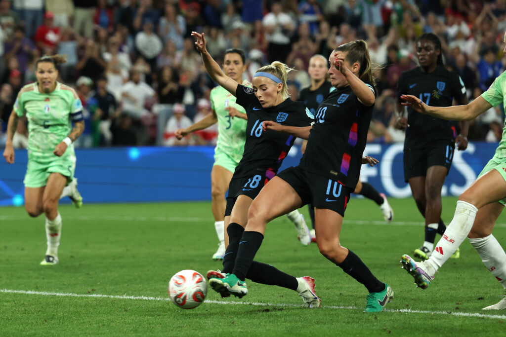 GENEVA, SWITZERLAND - JULY 22: Chloe Kelly of England scores her team's second goal, after her penalty kick was saved by Laura Giuliani of Italy during the UEFA Women's EURO 2025 Semi-Final match between England and Italy at Stade de Geneve on July 22, 2025 in Geneva, Switzerland. (Photo by Eddie Keogh/Getty Images)