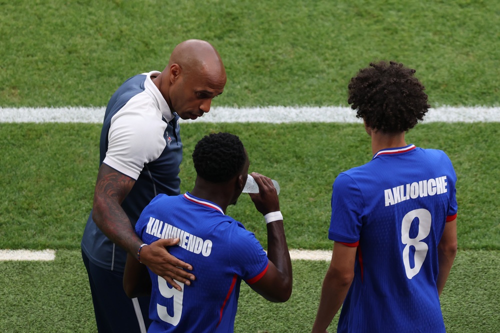 Arsenal show interest in £60m Monaco winger 2 PARIS, FRANCE: Thierry Henry, Head Coach of Team France speaks to Kiliann Sildillia #5 and Maghnes Akliouche #8 of Team France during the Men's Gold Medal match between France and Spain during the Olympic Games Paris 2024 at Parc des Princes on August 09, 2024. (Photo by Pascal Le Segretain/Getty Images)