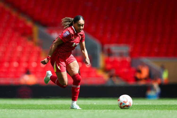 LIVERPOOL, ENGLAND: Olivia Smith of Liverpool runs with the ball during the Barclays Women's Super League match between Liverpool and Everton at An...