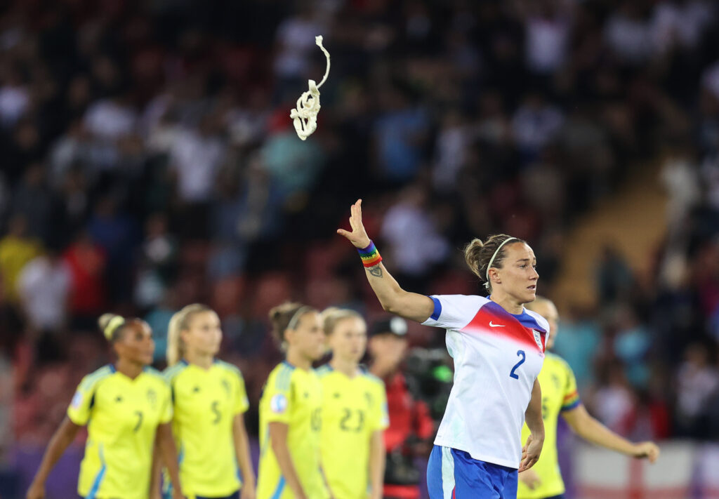 ZURICH, SWITZERLAND - JULY 17: Lucy Bronze of England unwraps a bandage from her leg as she steps up tot take a penalty during the shoot-out during the UEFA Womens EURO 2025 Quarter-Final match between Sweden and England at Stadion Letzigrund on July 17, 2025 in Zurich, Switzerland. (Photo by Charlotte Wilson/Getty Images)