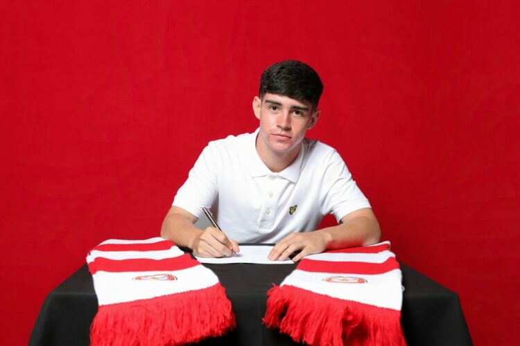 Coran Madden signing for Brentford (Photo via Madden on Instagram)