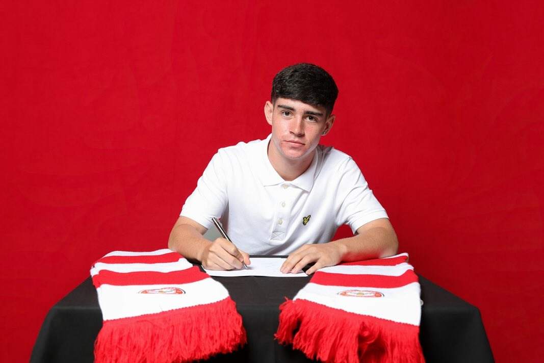 Coran Madden signing for Brentford (Photo via Madden on Instagram)