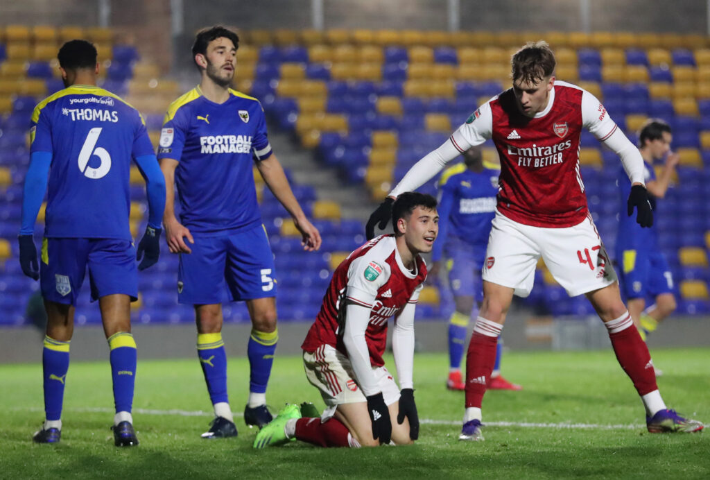Former Gunner shrugs off Zlatan comparisons after sealing move 2 WIMBLEDON, ENGLAND - DECEMBER 08: Gabriel Martinelli of Arsenal (kneeling) is consoled by team mate Nikolaj Moller as he misses a chance during the Papa John's Trophy second round match between AFC Wimbledon and Arsenal U21 at Plough Lane on December 08, 2020 in Wimbledon, England. (Photo by James Chance/Getty Images)