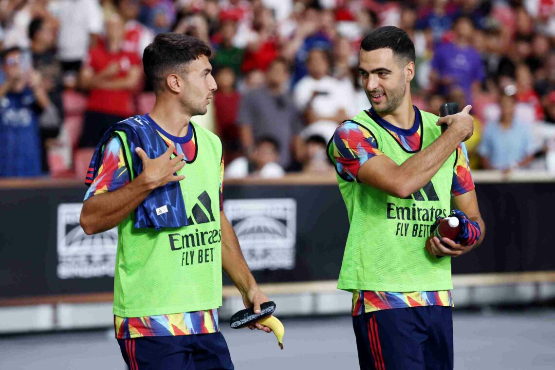 SINGAPORE, SINGAPORE - JULY 23: Martin Zubimendi and Mikel Merino of Arsenal walk out of the tunnel prior to the Pre-Season Friendly match between ...