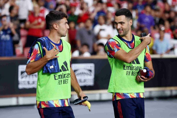 SINGAPORE, SINGAPORE - JULY 23: Martin Zubimendi and Mikel Merino of Arsenal walk out of the tunnel prior to the Pre-Season Friendly match between ...
