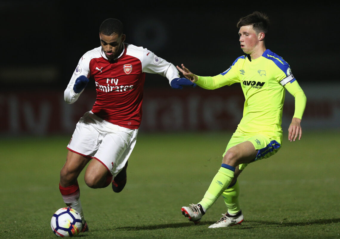 BOREHAMWOOD, ENGLAND - DECEMBER 15: Yassin Fortune of Arsenal attempts to get away from Charles Vernam of Derby during the Premier League 2 match b...