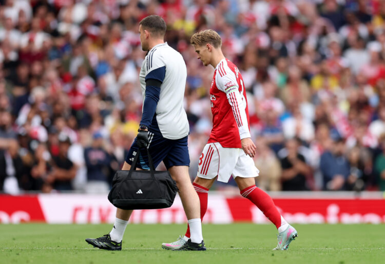 LONDON, ENGLAND - AUGUST 23: Martin Odegaard of Arsenal is substituted off with an injury during the Premier League match between Arsenal and Leeds...