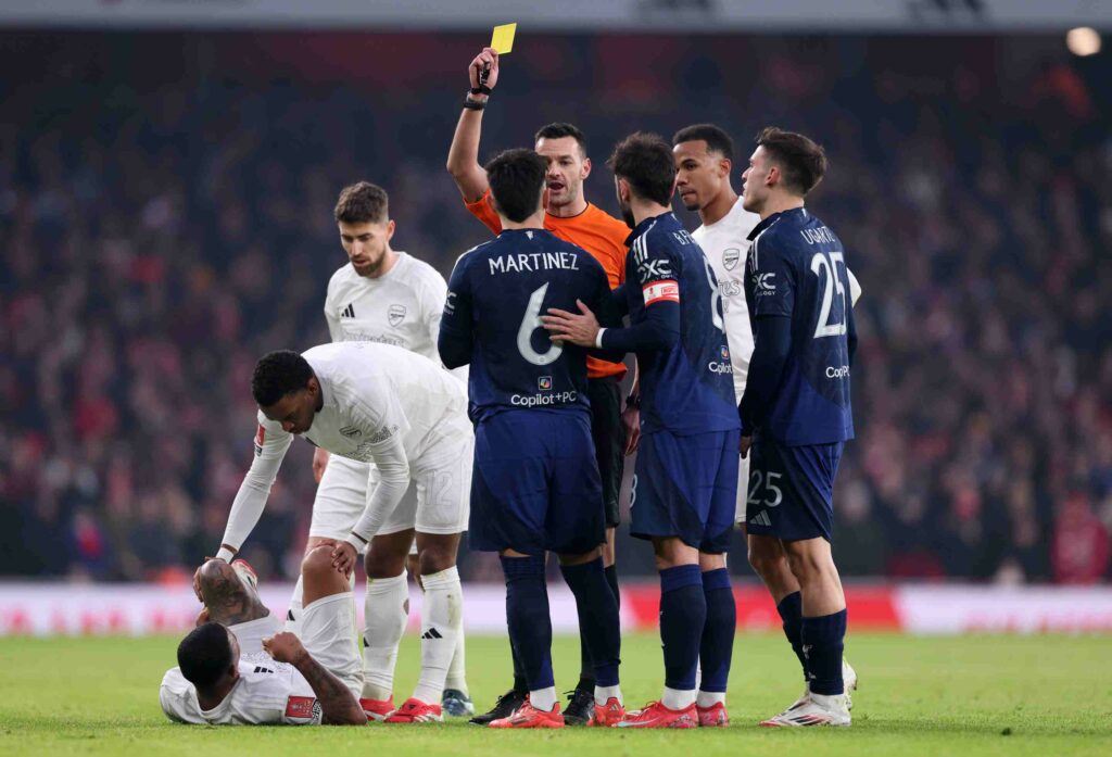 Key defender ruled out for Man United vs Arsenal 2 LONDON, ENGLAND - JANUARY 12: Referee Andrew Madley shows a yellow card to Lisandro Martinez of Manchester United during the Emirates FA Cup Third Round match between Arsenal and Manchester United at Emirates Stadium on January 12, 2025 in London, England. Arsenal are playing in a special all-white kit for today's FA Cup third-round tie as part of their ‘No More Red’ initiative which was launched in collaboration with Adidas in 2022 to keep young people safe from knife crime. (Photo by Julian Finney/Getty Images)