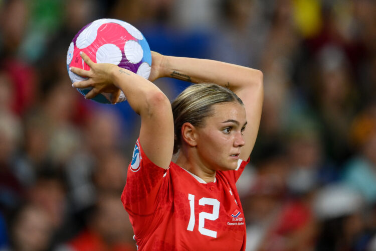 BRIGHTON, ENGLAND - JULY 15: Laura Wienroither of Austria takes a throw in during the UEFA Women's Euro England 2022 group A match between Austria ...