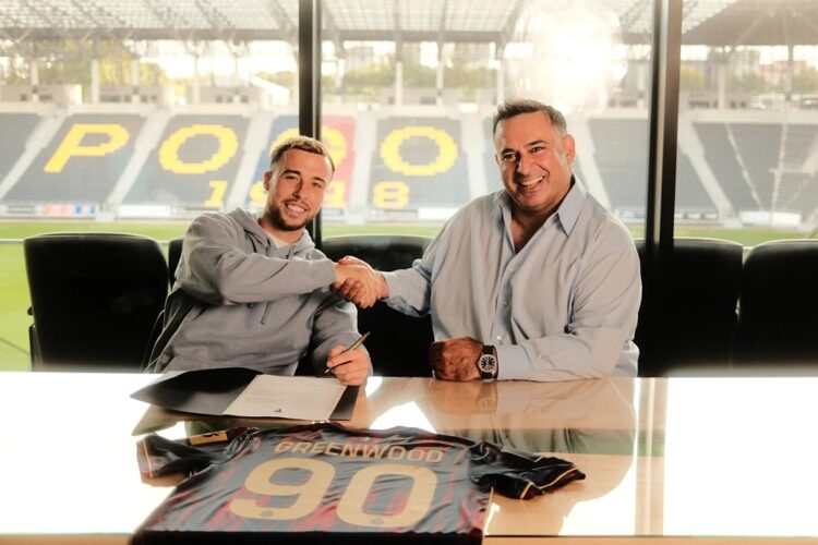 Sam Greenwood after signing for Pogon Szczecin (Photo via pogonszczecin.pl)