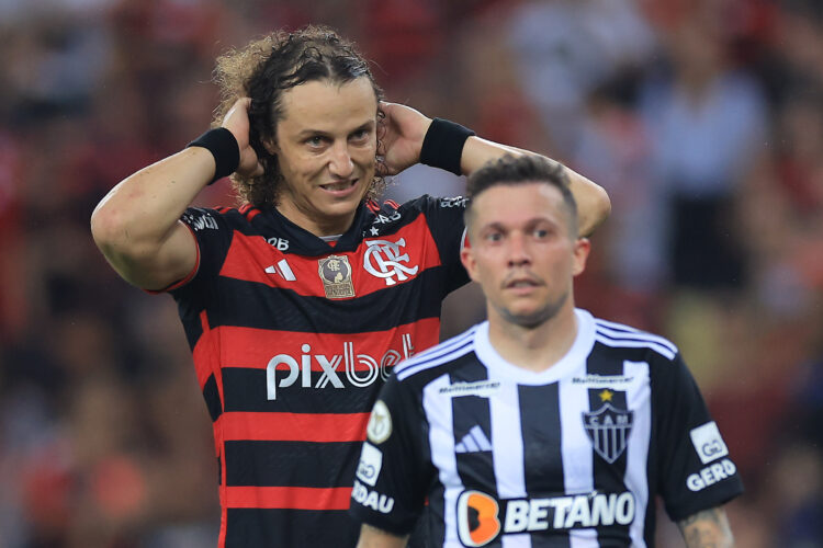 RIO DE JANEIRO, BRAZIL - NOVEMBER 13: David Luiz of Flamengo reacts after missing the penalty during the match between Flamengo and Atletico Mineir...