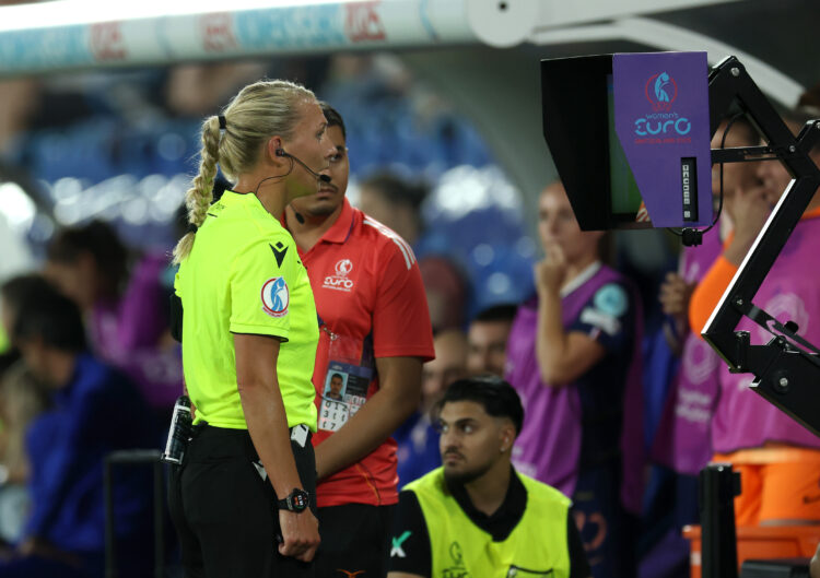 BASEL, SWITZERLAND - JULY 19: Referee Tess Olofsson reviews the VAR monitor which results in a goal scored by Grace Geyoro of France (not pictured)...