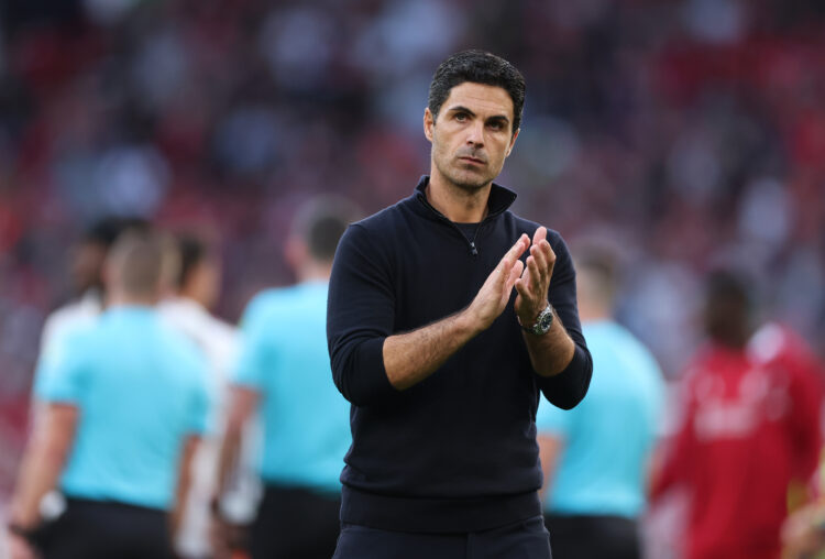 LIVERPOOL, ENGLAND - AUGUST 31: Mikel Arteta, Manager of Arsenal, applauds the fans following the team's defeat during the Premier League match bet...