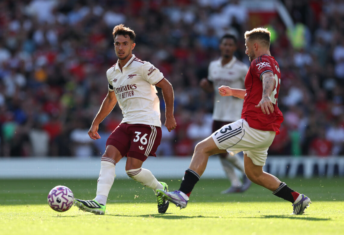 MANCHESTER, ENGLAND - AUGUST 17: Arsenal player Martin Zubimendi beats Luke Shaw to the ball during the Premier League match between Manchester Uni...