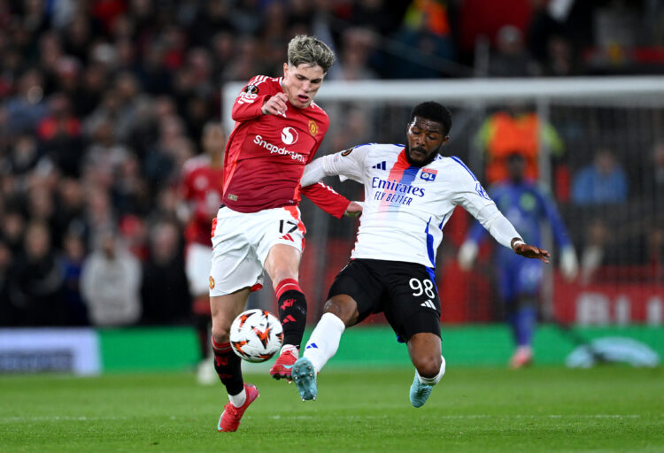 MANCHESTER, ENGLAND - APRIL 17: Alejandro Garnacho of Manchester United is challenged by Ainsley Maitland-Niles of Olympique Lyonnais during the UE...