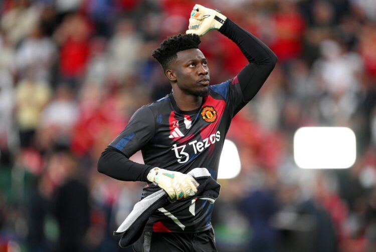 BILBAO, SPAIN: Andre Onana of Manchester United acknowledges the fans as he enters the pitch to warm up prior to the UEFA Europa League Final 2025 ...