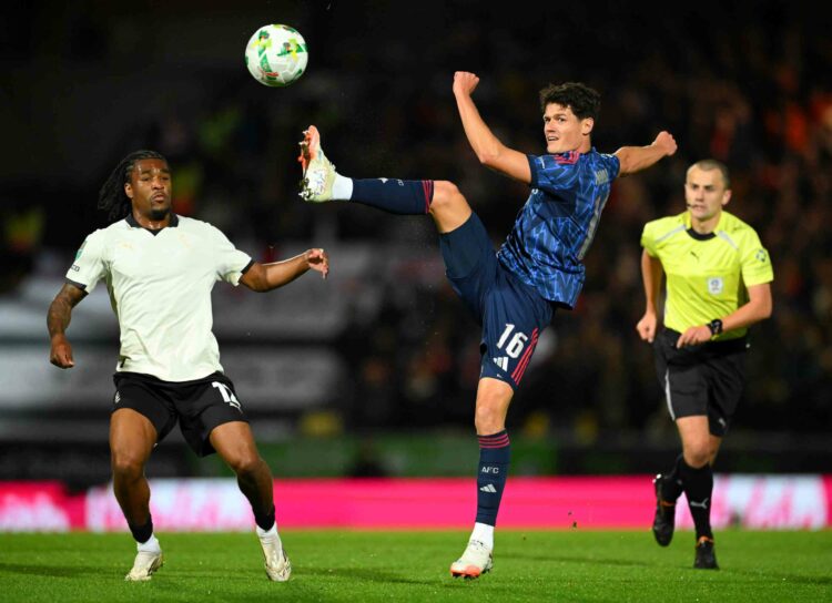 Christian Noergaard of Arsenal and Rhys Walters of Port Vale compete for the ball during the Carabao Cup Third Round match between Port Vale and Ar...