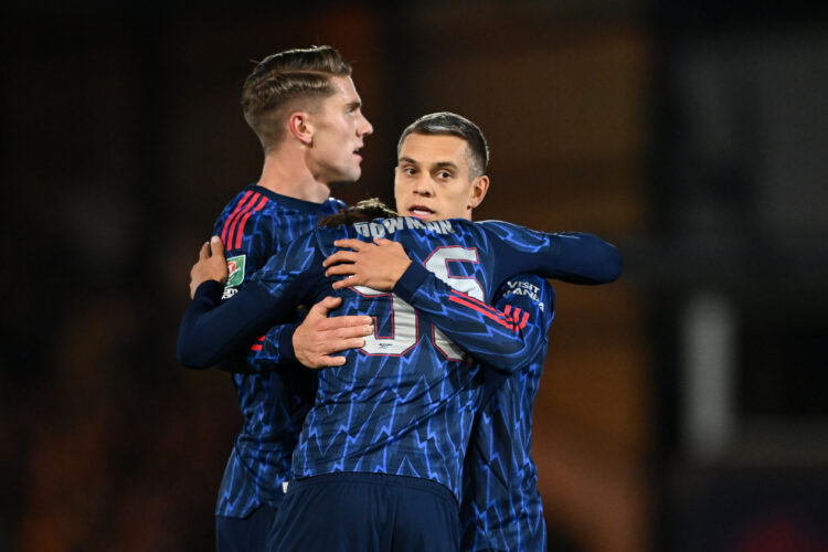 Leandro Trossard of Arsenal celebrates with teammates Viktor Gyoekeres and Max Dowman after scoring his team's second goal during the Carabao Cup T...