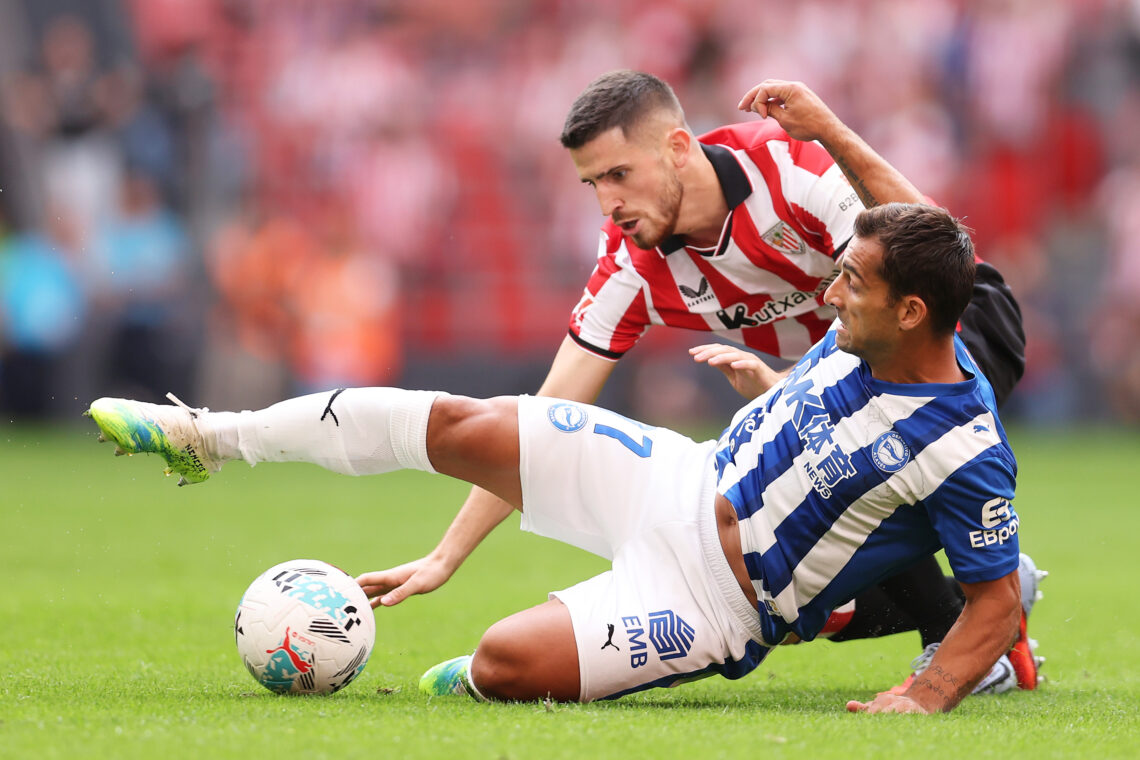 BILBAO, SPAIN - SEPTEMBER 13: Jonny of Deportivo Alaves battles for possession with Oihan Sancet of Athletic Club during the LaLiga EA Sports match...