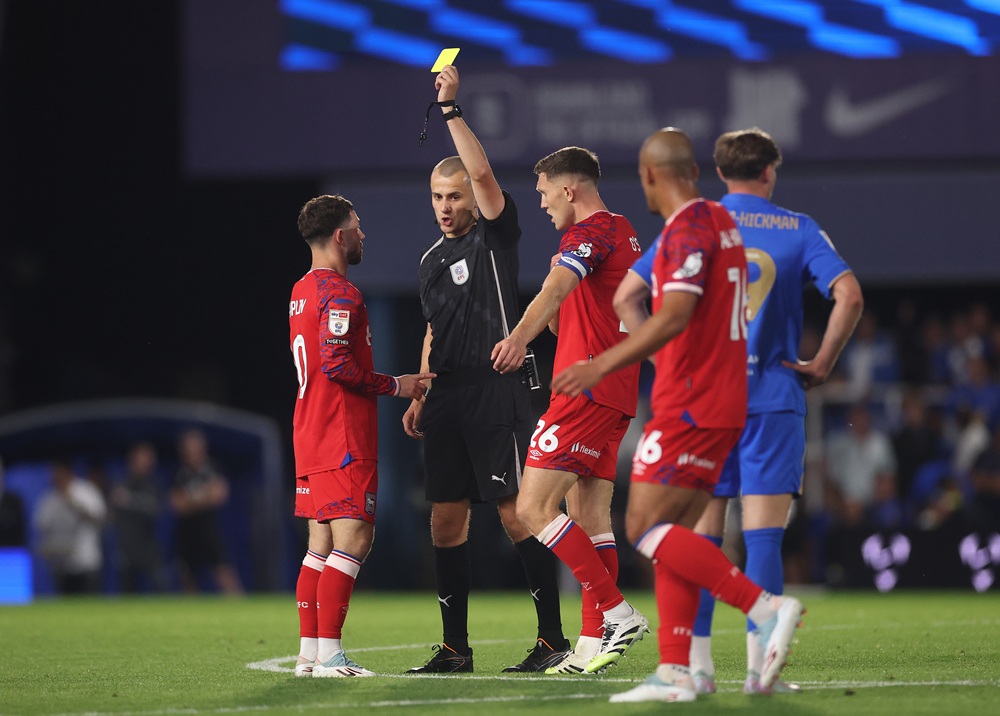 BIRMINGHAM, ENGLAND: Conor Chaplin of Ipswich Town is shown a yellow card by referee Andrew Kitchen during the Sky Bet Championship match between Birmingham City and Ipswich Town at St Andrew’s at Knighthead Park on August 08, 2025. (Photo by Carl Recine/Getty Images)
