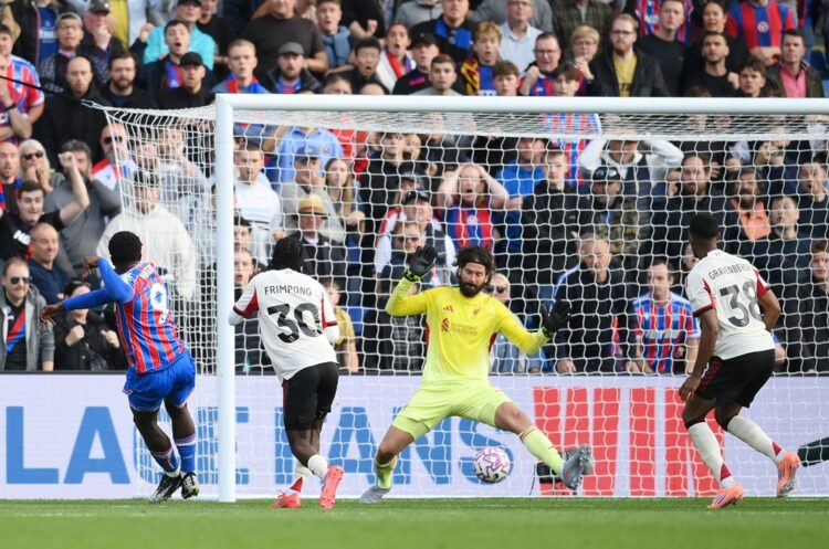 LONDON, ENGLAND: Eddie Nketiah of Crystal Palace scores his team's second goal past Alisson Becker of Liverpool during the Premier League match bet...