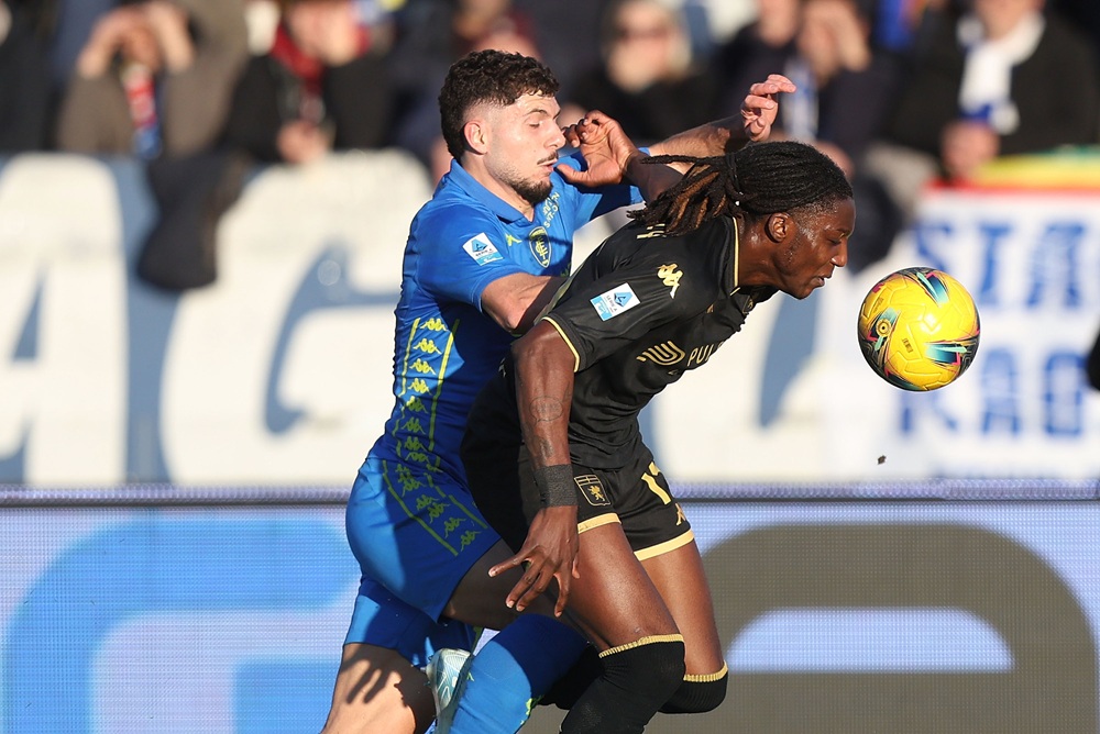 EMPOLI, ITALY: Liberato Cacace of Empoli FC battles for the ball with Brooke Norton-Cuffy of Genoa CFC during the Serie A match between Empoli and Genoa at Stadio Carlo Castellani on December 28, 2024. (Photo by Gabriele Maltinti/Getty Images)