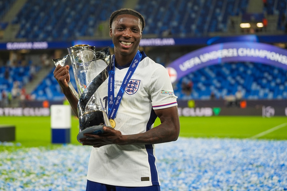 BRATISLAVA, SLOVAKIA: Brooke Norton-Cuffy of U21 England celebrates with the UEFA European Under-21 Championship trophy after his team's victory in the UEFA European Under-21 Championship 2025 Final match between England and Germany at National Football stadium on June 28, 2025. (Photo by Christian Hofer/Getty Images)