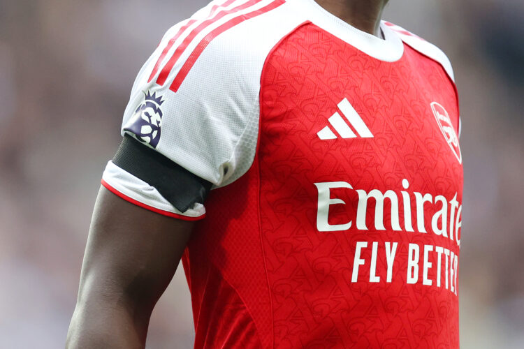 NEWCASTLE UPON TYNE, ENGLAND - SEPTEMBER 28: A black armband worn by Bukayo Saka of Arsenal in memory of Arsenal player Billy Vigar during the Prem...