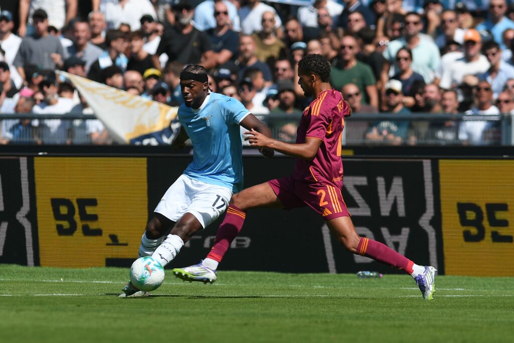ROME, ITALY - SEPTEMBER 21: Devyne Rensch of AS Roma fights for the ball with Nuno Tavares of SS Lazio during the Serie A match between SS Lazio and AS Roma at Stadio Olimpico on September 21, 2025 in Rome, Italy. (Photo by Silvia Lore/Getty Images)