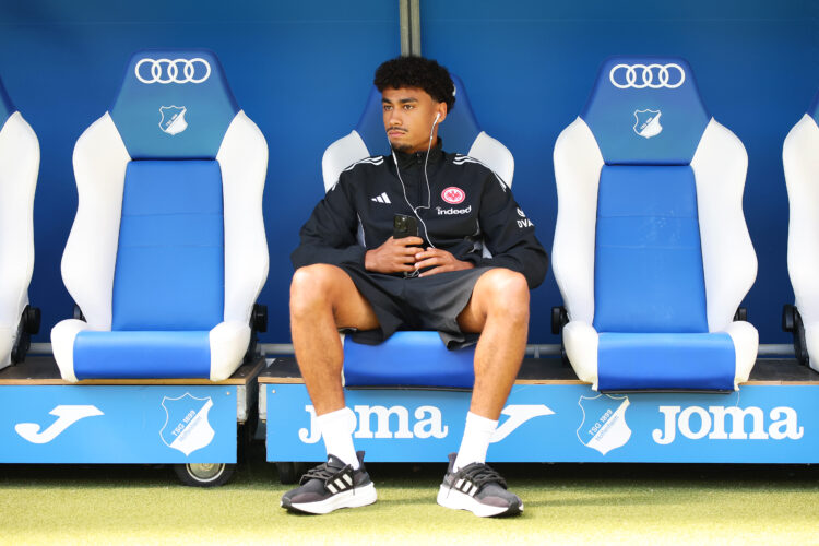 SINSHEIM, GERMANY - AUGUST 30: Nathaniel Brown of Eintracht Frankfurt looks on from the bench prior to the Bundesliga match between TSG Hoffenheim ...