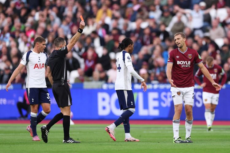 LONDON, ENGLAND: Tomas Soucek of West Ham United is shown a red card by referee Jarred Gillett during the Premier League match between West Ham Uni...