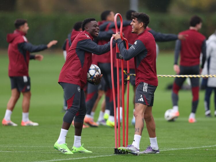 LONDON COLNEY, ENGLAND: Bukayo Saka and Piero Hincapie of Arsenal laugh during a training session at Sobha Realty Training Centre on October 20, 20...