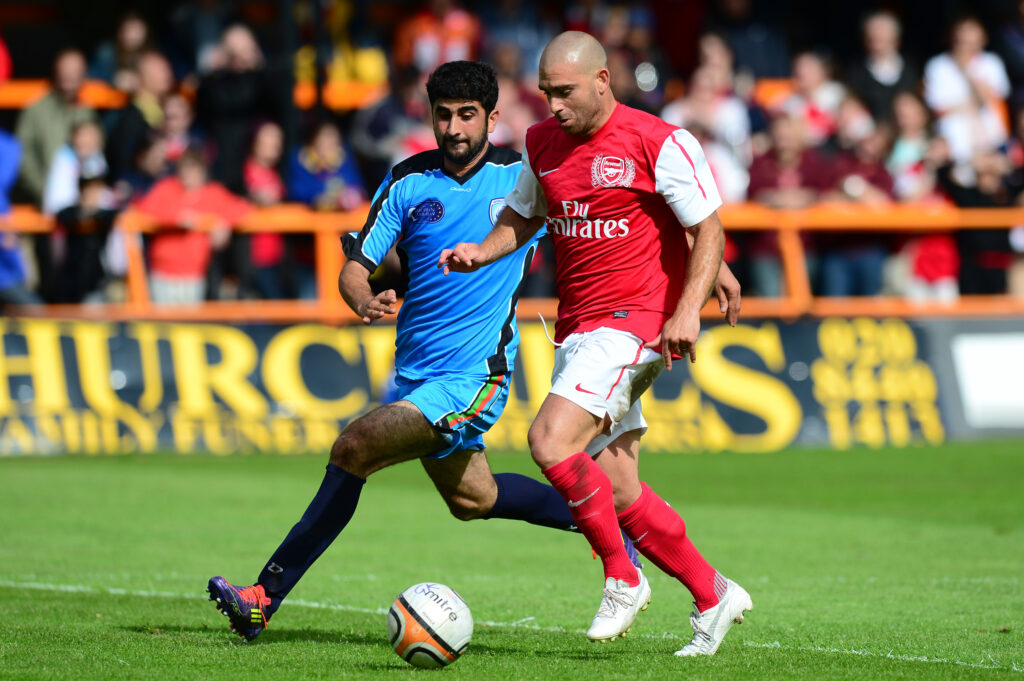Former Arsenal youngster admits 'biggest regret' was rejecting Gunners deal 2 BARNET, ENGLAND - JUNE 23: Omer Riza of Arsenal Legends XI (R) competes for the ball during the charity football match between Arsenal Legends XI and World Refugee Internally Displaced Persons (IDP) XI at Underhill Stadium on June 23, 2013 in Barnet, United Kingdom. (Photo by Alex Broadway/Getty Images)