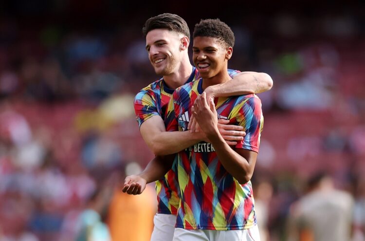LONDON, ENGLAND: Declan Rice and Andrew Harriman-Annous of Arsenal hug as they warm up prior to the pre-season friendly match between Arsenal and V...