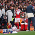 LONDON, ENGLAND - OCTOBER 04: Martin Odegaard of Arsenal looks dejected as he leaves the pitch injured during the Premier League match between Arsenal and West Ham United at Emirates Stadium on October 04, 2025 in London, England. (Photo by Alex Pantling/Getty Images)
