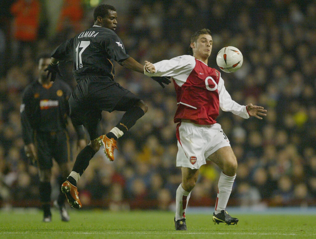 Hated ex-Gunner to fight in charity boxing match 3 LONDON - DECEMBER 2: Henri Camara of Wolverhampton Wanderers tries to tackle David Bentley of Arsenal during the Carling Cup fourth round match between Arsenal and Wolverhampton Wanderers at Highbury on December 2, 2003 in London. (Photo by Clive Mason/Getty Images)