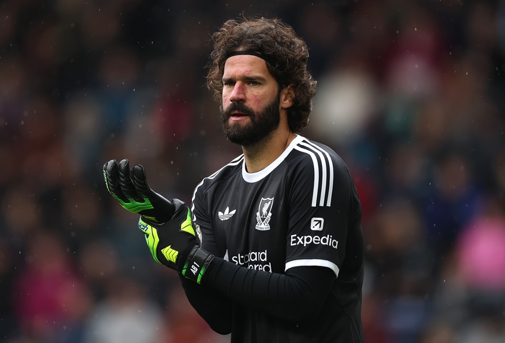 BURNLEY, ENGLAND: Liverpool goalkeeper Alisson Becker reacts during the Premier League match between Burnley and Liverpool at Turf Moor on September 14, 2025. (Photo by Stu Forster/Getty Images)