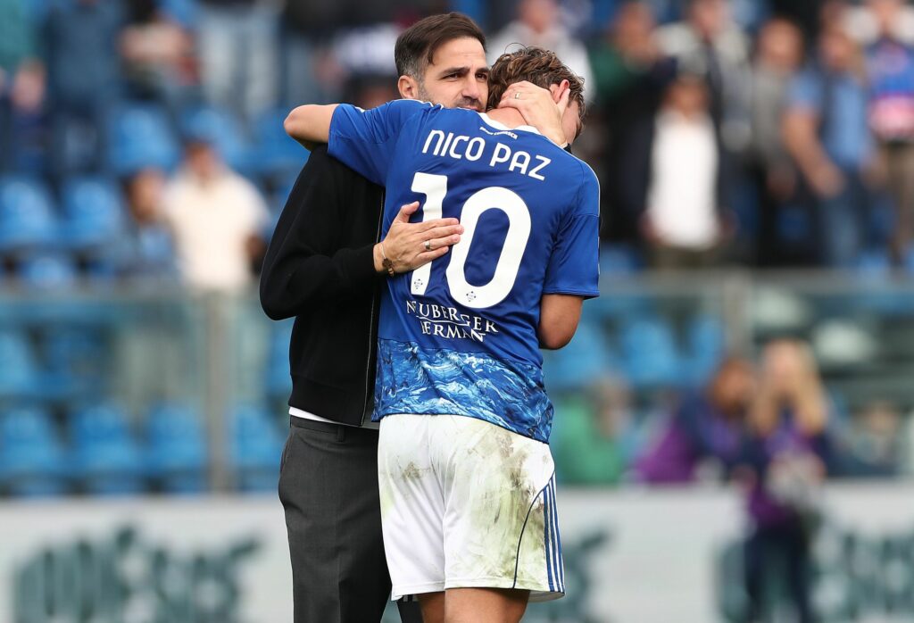 COMO, ITALY - OCTOBER 19: Como 1907 coach Cesc Fabregas and Nico Paz of Como 1907celebrate the victory at the end of the Serie A match between Como 1907 and Juventus FC at Giuseppe Sinigaglia Stadium on October 19, 2025 in Como, Italy. (Photo by Marco Luzzani/Getty Images)