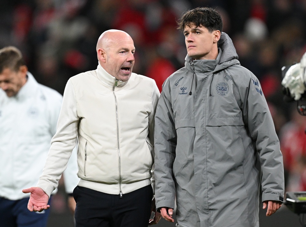 COPENHAGEN, DENMARK: Brian Riemer, head coach of Denmark talks with Christian Norgaard of Denmark at full time after the UEFA Nations League 2024/25 League A Group A4 match between Denmark and Spain at on November 15, 2024. (Photo by Stuart Franklin/Getty Images)