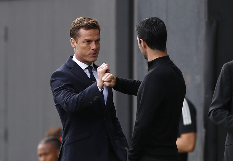 LONDON, ENGLAND - SEPTEMBER 12: Scott Parker, Manager of Fulham speaks with Mikel Arteta, Manager of Arsenal prior to the Premier League match betw...