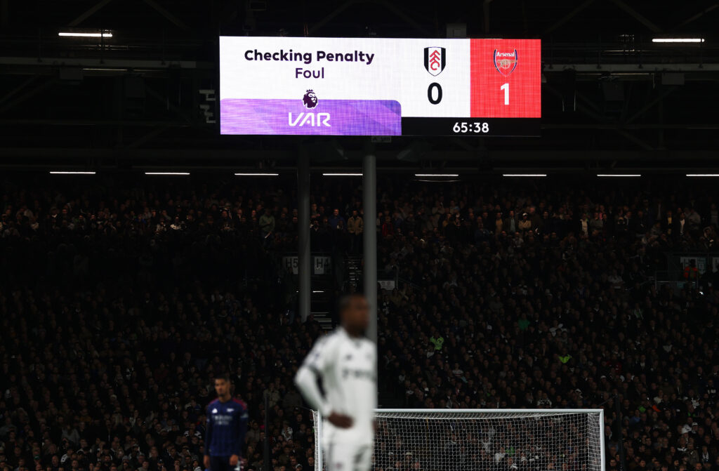 Arsenal grind out three points at Fulham as VAR interferes again 5 LONDON, ENGLAND - OCTOBER 18: A general view as the LED screen displays the message "Checking Penalty Foul" after Bukayo Saka of Arsenal (not pictured) was challenged by Kevin of Fulham (not pictured) and Referee Anthony Taylor (not pictured) awarded a penalty during the Premier League match between Fulham and Arsenal at Craven Cottage on October 18, 2025 in London, England. (Photo by Alex Pantling/Getty Images)