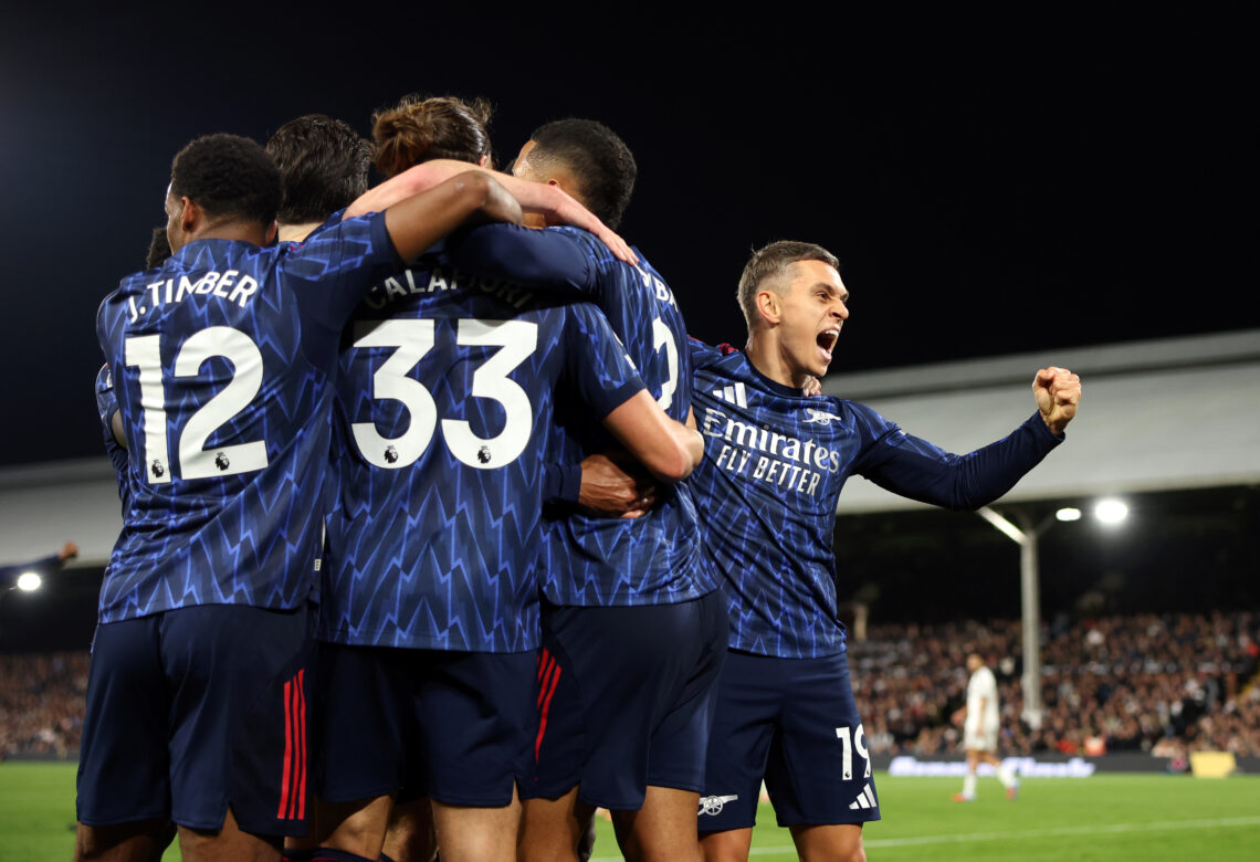 LONDON, ENGLAND - OCTOBER 18: Leandro Trossard of Arsenal celebrates scoring his team's first goal with teammates during the Premier League match b...