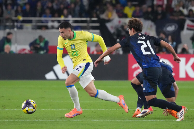CHOFU, JAPAN: Gabriel Martinelli of Brazil (L) goes past Kaishu Sano of Japan (R) during the international friendly match between Japan and Brazil ...