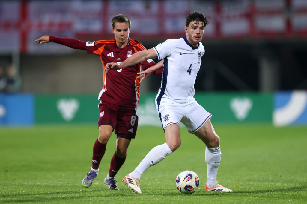 Declan Rice: England are building something 'really really special' 2 RIGA, LATVIA - OCTOBER 14: Declan Rice of England battles for possession with Renars Varslavans of Latvia during the FIFA World Cup 2026 qualifier match between Latvia and England at Daugava Stadium on October 14, 2025 in Riga, Latvia. (Photo by Carl Recine/Getty Images)