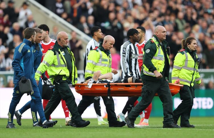 NEWCASTLE UPON TYNE, ENGLAND: Tino Livramento of Newcastle United is stretchered off with an injury during the Premier League match between Newcast...