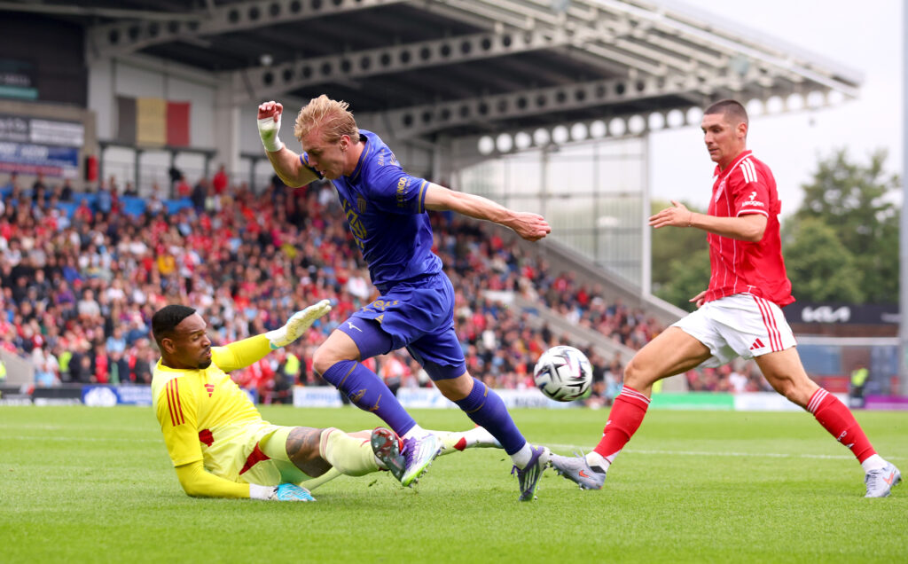 CHESTERFIELD, ENGLAND - JULY 19: Nottingham Forest goalkeeper Carlos Miguel tackles Mika Biereth of AS Monaco during the pre-season friendly match between Nottingham Forest and AS Monaco at SMH Group Stadium on July 19, 2025 in Chesterfield, England. (Photo by Ed Sykes/Getty Images)