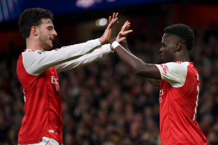 LONDON, ENGLAND - OCTOBER 01: Bukayo Saka of Arsenal celebrates with teammate Declan Rice after scoring his team's second goal during the UEFA Cham...