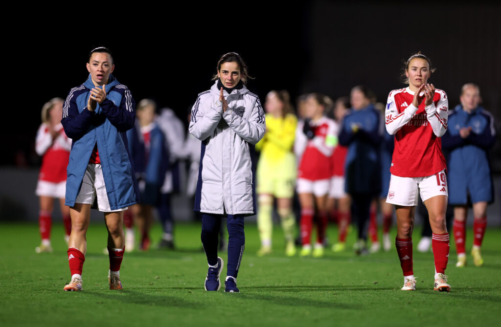 BOREHAMWOOD, ENGLAND - NOVEMBER 19: Renee Slegers, Manager of Arsenal, applauds the fans with Katie McCabe and Caitlin Foord of Arsenal after the team's victory in the UEFA Women's Champions League 2025/26 league phase match between Arsenal FC and Real Madrid CF at Meadow Park on November 19, 2025 in Borehamwood, England. (Photo by Julian Finney/Getty Images)