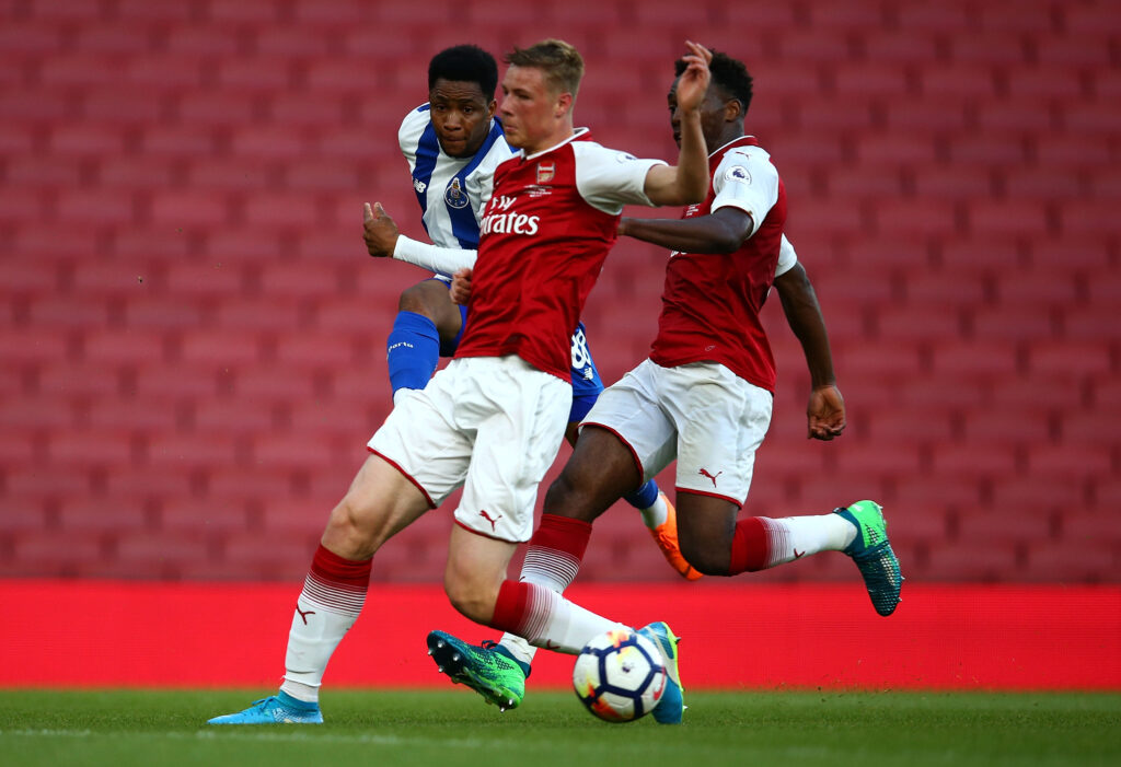 How Arsenal gave Dan Ballard an unprecedented second chance that launched his career 3 LONDON, ENGLAND - MAY 08: Danny Ballard and Tolaji Bola of Arsenal U/23 compete for the ball against Musa Yahaya of Porto U23 during the Premier League International Trophy between Arsenal U23 and Porto U23 at Emirates Stadium on May 8, 2018 in London, England. (Photo by Jack Thomas/Getty Images)